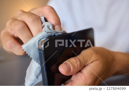 Clean your smartphone camera lens regularly for optimal clarity and high quality images Clean your smartphone camera lens regularly for optimal clarity and high quality images 127804099