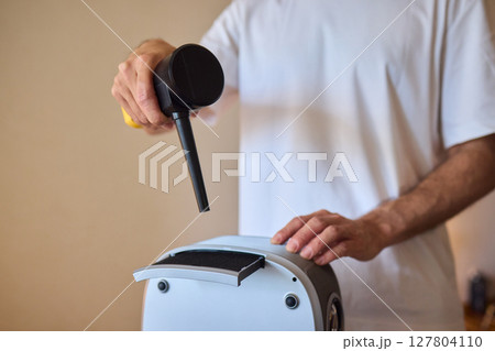 How To Effectively Clean a Portable Air Purifier Filter Utilizing a Vacuum Cleaning Tool 127804110
