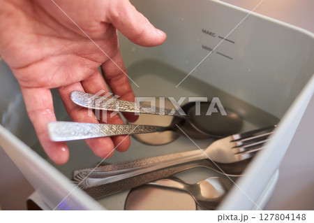 Kitchen Tools and Equipment Arranged Neatly in a Basket for Easy Access and Organization Kitchen Tools and Equipment Arranged Neatly in a Basket for Easy Access and Organization 127804148