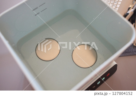 Kitchen Tools and Equipment Arranged Neatly in a Basket for Easy Access and Organization Kitchen Tools and Equipment Arranged Neatly in a Basket for Easy Access and Organization 127804152