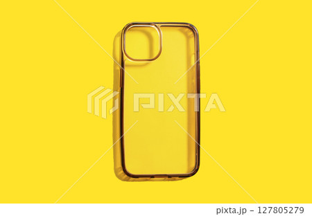 Transparent phone case displayed in clean and dirty conditions, illustrating its durability and practicality, set against bright yellow background for visual appeal. Transparent phone case displayed in clean and dirty conditions, illustrating its durability and practicality, set against bright yellow background for visual appeal. 127805279