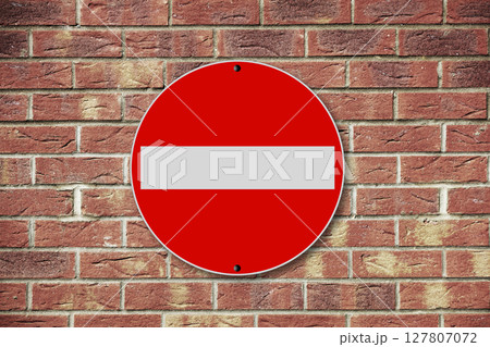 No entry sign on a brick wall background No entry sign on a brick wall background 127807072