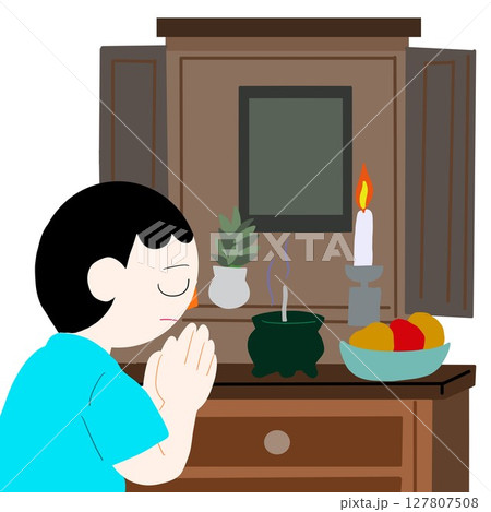 仏壇に手を合わせる人 127807508