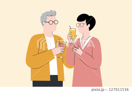 Couple Toasting with Cocktails 127811536