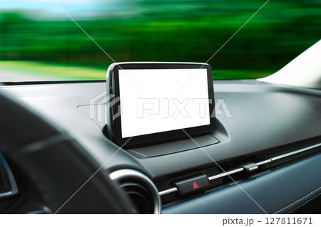 A blank white screen for text decoration of an in-car display unit on the dashboard while driving. A blank white screen for text decoration of an in-car display unit on the dashboard while driving. 127811671