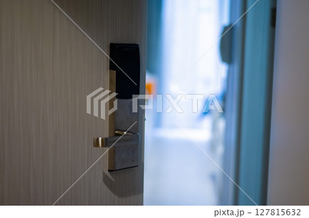 Electronic lock on the door in the hotel. Electronic lock on the door in the hotel. 127815632