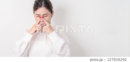 Business Woman having Nose pain for concepts of Nose disease, Common Cold, Influenza, Flu, Covid 19, Respiratory Infection, Sinusitis, Allergic Rhinitis, Asthma, Allergy, Dry nose Anosmia and Health 127816292