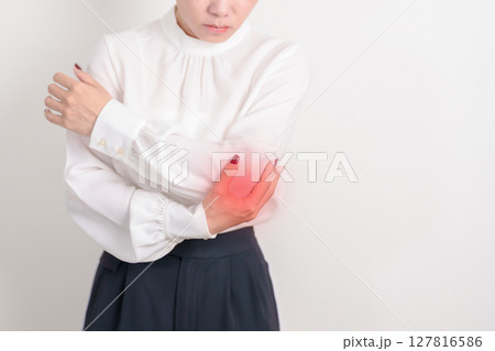 Business Woman having elbow ache for concepts of Tennis Elbow, muscle pain and Sprain, lateral epicondylitis, Bursitis, injury, Office syndrome, Health care and medical Business Woman having elbow ache for concepts of Tennis Elbow, muscle pain and Sprain, lateral epicondylitis, Bursitis, injury, Office syndrome, Health care and medical 127816586