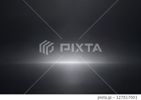 Soft horizontal light fade in dark black studio 127817001