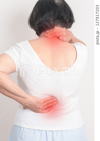 Elderly woman having back body ache for concepts of Back Muscle Strain, Piriformis Syndrome, Low Back Pain, Lumbar Disc Degeneration, Herniated, Osteoporosis, Spinal Compression and Health care 127817203