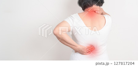 Elderly woman having back body ache for concepts of Back Muscle Strain, Piriformis Syndrome, Low Back Pain, Lumbar Disc Degeneration, Herniated, Osteoporosis, Spinal Compression and Health care 127817204