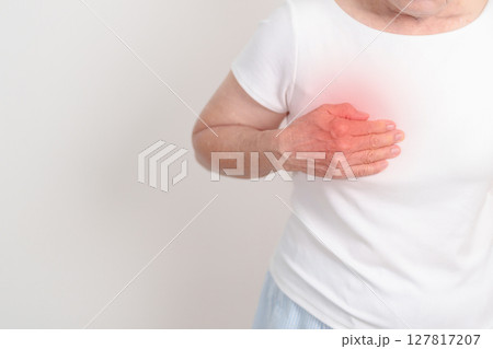 Elderly Woman having Chest pain for concepts of Lung Disease, Lung Cancer, Asthma, Chronic Obstructive Pulmonary or COPD, Bronchitis, Emphysema, Cystic Fibrosis, Bronchiectasis, Pneumonia and Health Elderly Woman having Chest pain for concepts of Lung Disease, Lung Cancer, Asthma, Chronic Obstructive Pulmonary or COPD, Bronchitis, Emphysema, Cystic Fibrosis, Bronchiectasis, Pneumonia and Health 127817207