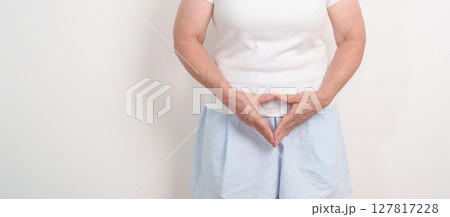 Woman hand heart shape for Ovarian, Uterine and Cervical awareness month cancer, Cervix disorder, Endometriosis, Hysterectomy, Uterine fibroids, Reproductive system and women health concepts 127817228
