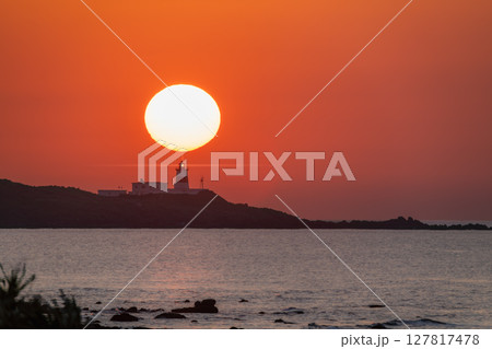 Spring Sunset Over the Coastline at Shimen, New Taipei City, Taiwan. Spring Sunset Over the Coastline at Shimen, New Taipei City, Taiwan. 127817478