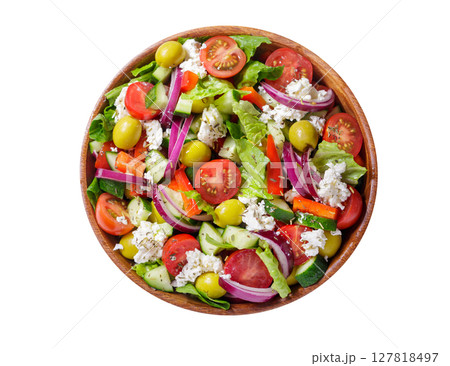 Plate of fresh salad with vegetables, feta cheese and olives isolated on white background 127818497