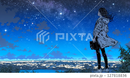 星空を眺めている若い女性