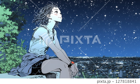 星空を眺めている若い女性