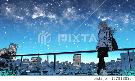 星空を眺めている若い女性