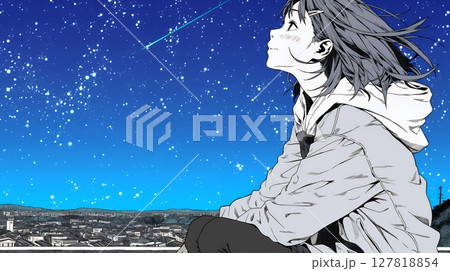 星空を眺めている若い女性