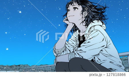 星空を眺めている若い女性
