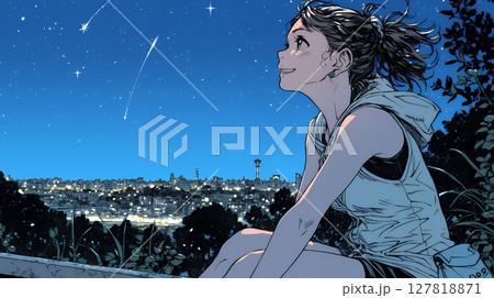 星空を眺めている若い女性