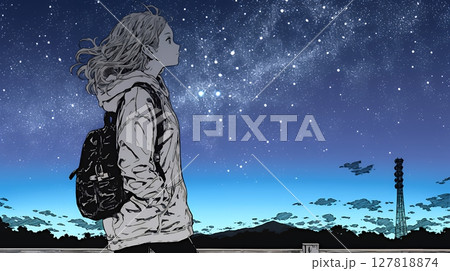 星空を眺めている若い女性