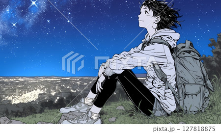 星空を眺めている若い女性