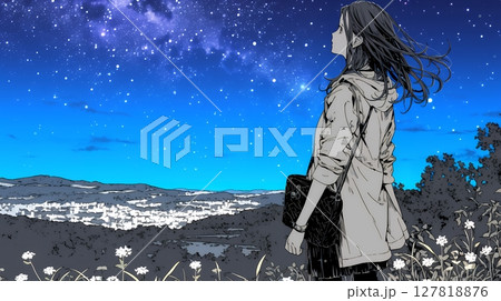 星空を眺めている若い女性
