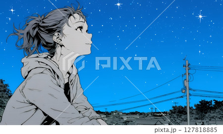 星空を眺めている若い女性