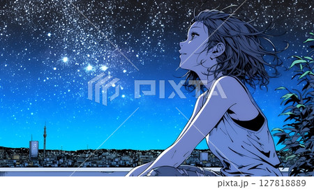 星空を眺めている若い女性