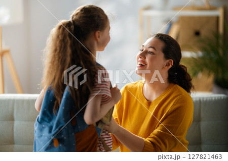 Happy family preparing for school Happy family preparing for school 127821463
