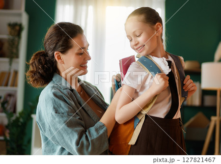 Happy family preparing for school Happy family preparing for school 127821467