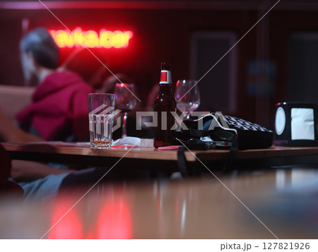Enjoying a Cozy Bar Scene that Features Delightful Drinks and Captivating Retro Decor Enjoying a Cozy Bar Scene that Features Delightful Drinks and Captivating Retro Decor 127821926