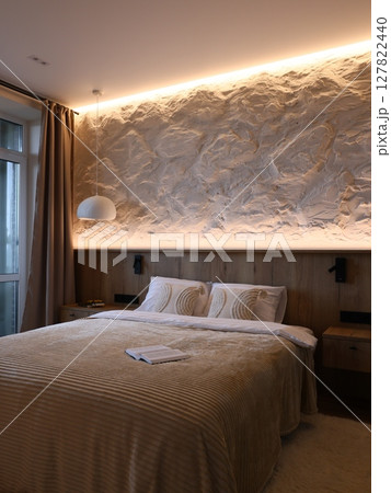 Explore Modern Bedroom Design with Elegant Lighting for a cozy, stylish atmosphere Explore Modern Bedroom Design with Elegant Lighting for a cozy, stylish atmosphere 127822440