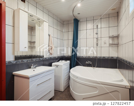 A Modern Bathroom featuring a Soothing Design along with Elegant Fixtures and Amenities 127822457