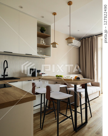 A Modern Kitchen Dining Area with Chic and Stylish Decor Boosting Your Homes Aesthetic 127822490