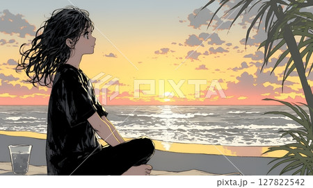 のんびり・ゆったり：夏のビーチで夕日を眺める若い女性