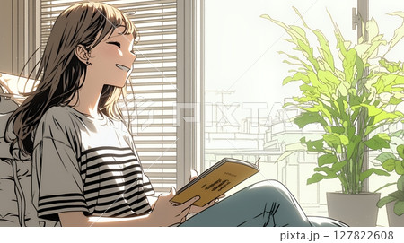 のんびり・ゆったり：窓辺でリラックスして本を読んでいる若い女性