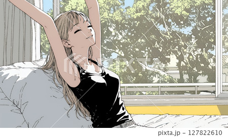 のんびり・ゆったり：朝日を浴びベッドで寛いでいる若い女性