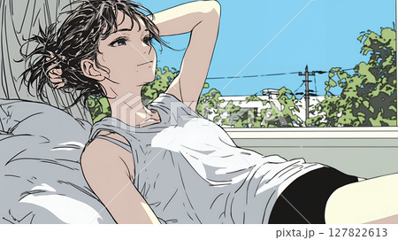 のんびり・ゆったり：朝日を浴びベッドで寛いでいる若い女性