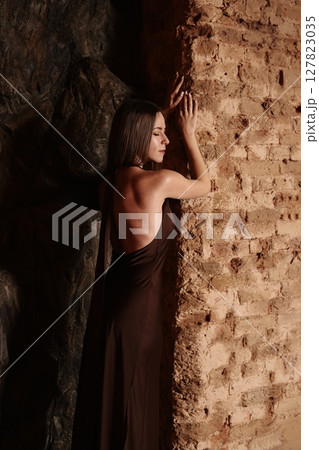 An Elegant Woman depicted in an Ethereal Setting that captivates the viewers eye and imagination An Elegant Woman depicted in an Ethereal Setting that captivates the viewers eye and imagination 127823035