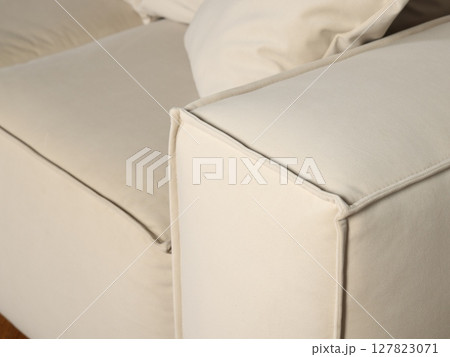 A Modern White Couch with Comfortable Cushions for Chic and Stylish Living Spaces A Modern White Couch with Comfortable Cushions for Chic and Stylish Living Spaces 127823071