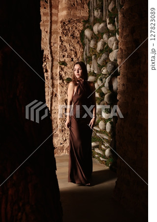 A Surreal Portrait Set Against Ancient Ruins Featuring a Floating Pose That Captivates All A Surreal Portrait Set Against Ancient Ruins Featuring a Floating Pose That Captivates All 127823089