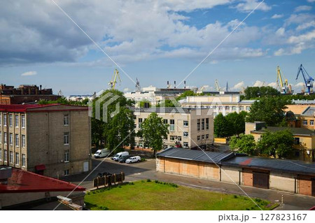 An Urban Landscape Featuring an Industrial Background and a Beautiful Cloudy Sky Above It An Urban Landscape Featuring an Industrial Background and a Beautiful Cloudy Sky Above It 127823167