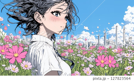 コスモス畑にいる若い女性