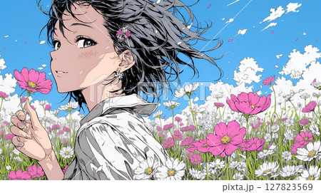 コスモス畑にいる若い女性