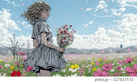 コスモス畑にいる若い女性