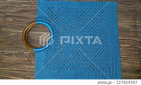 Knitting a product from a cord with a crochet hook. Step-by-step instructions Knitting a product from a cord with a crochet hook. Step-by-step instructions 127824307