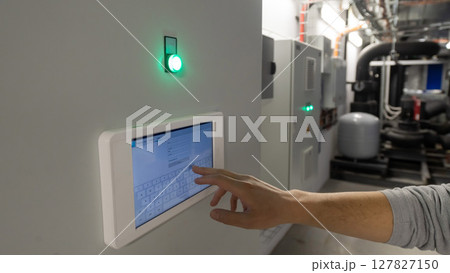 Modern Control System Interface with Green Indicator Light.  127827150