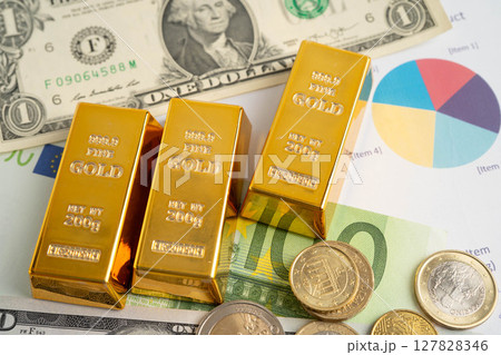 Gold bars with US dollar and Euro banknote money, finance trading investment business currency. 127828346
